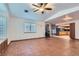 Open concept layout with tile flooring and natural light, connecting the living area to the kitchen at 798 Shirley Ln, Boulder City, NV 89005