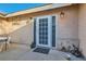 A charming patio features a textured wall, decorative accents, and an outdoor seating area at 798 Shirley Ln, Boulder City, NV 89005