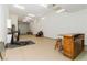 Spacious basement with bar, rec area, and exercise equipment at 814 Lake Hill Dr, Boulder City, NV 89005
