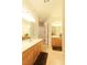 Bathroom with a double sink vanity and ample counter space, tile flooring, and neutral color palette at 814 Lake Hill Dr, Boulder City, NV 89005