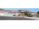 Spacious home featuring a tile roof, desert landscaping, and a three-car garage at 814 Lake Hill Dr, Boulder City, NV 89005