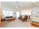 Open-concept living room with ceiling fans and lots of natural light at 814 Lake Hill Dr, Boulder City, NV 89005