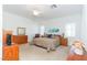 Bedroom with a ceiling fan, lots of natural light, and wood furniture at 814 Lake Hill Dr, Boulder City, NV 89005