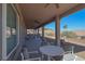 Large covered patio with ceiling fans perfect for outdoor dining at 814 Lake Hill Dr, Boulder City, NV 89005