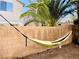 Backyard featuring hammock and privacy fence, perfect for outdoor relaxation at 8209 Violet Meadow Ct, Las Vegas, NV 89117