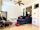 Comfortable living room featuring tile flooring and furniture at 8209 Violet Meadow Ct, Las Vegas, NV 89117