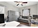 Charming bedroom featuring a built-in Murphy bed and desk area, perfect for a home office or guest room at 9138 Sea Mink Ave, Las Vegas, NV 89149