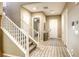 Hallway with staircase and tile flooring at 9607 Starfish Reef Way, Las Vegas, NV 89178