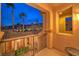 Comfortable covered balcony overlooking the front yard and neighborhood at 11342 Winter Cottage Pl, Las Vegas, NV 89135