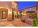 Private courtyard features brick paving, outdoor seating and mature landscaping at 11342 Winter Cottage Pl, Las Vegas, NV 89135