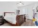 Bright bedroom featuring a ceiling fan, white walls, and a bookcase at 12125 Arrebol Ave, Las Vegas, NV 89138