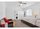 Bright, modern bedroom with a patterned bedspread, plush carpet, and built-in wardrobe at 12125 Arrebol Ave, Las Vegas, NV 89138