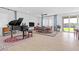 Spacious dining area with tile floors, a dining table, grand piano, and natural light at 12125 Arrebol Ave, Las Vegas, NV 89138