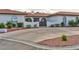 Inviting single-story home featuring stucco walls, a tile roof, and manicured landscaping at 1780 Westwind Rd, Las Vegas, NV 89146