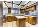 Bright kitchen featuring white countertops, an island, and stainless steel refrigerator at 1780 Westwind Rd, Las Vegas, NV 89146