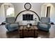 Cozy living area with fireplace and hardwood floors, perfect for relaxing at 1780 Westwind Rd, Las Vegas, NV 89146