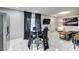 Open-concept living space with tile floors, comfortable seating, and a dining area at 1780 Westwind Rd, Las Vegas, NV 89146