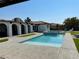 Stunning backyard pool and spa with beautiful tile and deck, perfect for outdoor relaxation at 1780 Westwind Rd, Las Vegas, NV 89146