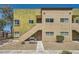 Well-maintained condominium building with easy access stairways and colorful landscaping at 1810 N Decatur Blvd # 201, Las Vegas, NV 89108