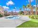 Inviting community pool surrounded by lush landscaping and palm trees at 1810 N Decatur Blvd # 201, Las Vegas, NV 89108