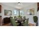 Cozy dining room with seating for six and bright natural lighting at 1810 N Decatur Blvd # 201, Las Vegas, NV 89108