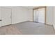 Spacious living room with a large window and front door at 1830 N Buffalo Dr # 2106, Las Vegas, NV 89128
