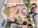 Aerial view of a single Gathering home showcasing its solar panels, landscaping, and outdoor seating at 184 Timeless View Ct, Henderson, NV 89012