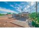 Backyard with a concrete slab, foliage, and a shed at 2229 La Puente St, Las Vegas, NV 89115