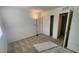A bright bedroom features a closet and neutral color palette at 2734 Champagne Gold Ave, North Las Vegas, NV 89086
