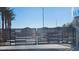 Community entry gate with landscaping and a view of the neighborhood at 2734 Champagne Gold Ave, North Las Vegas, NV 89086