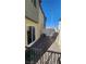 A fenced in patio with brick pavers and exterior access at 2734 Champagne Gold Ave, North Las Vegas, NV 89086