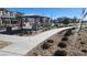 Community walking path with landscaping, benches, and shaded seating areas at 2734 Champagne Gold Ave, North Las Vegas, NV 89086