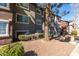 Building exterior showing well-maintained landscaping and multiple units with large windows at 2750 S Durango Dr # 2012, Las Vegas, NV 89117