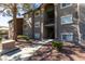 Exterior shot of a building with manicured landscaping and walkways on a sunny day at 2750 S Durango Dr # 2012, Las Vegas, NV 89117