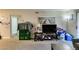 Living room with carpeted floors, neutral walls, and sliding glass door to the balcony at 2750 S Durango Dr # 2012, Las Vegas, NV 89117