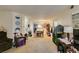 Open floor plan with living room and dining area featuring neutral walls and flooring at 2750 S Durango Dr # 2012, Las Vegas, NV 89117