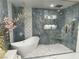 Beautiful bathroom boasts a soaking tub, a spacious shower, and stylish fixtures at 3341 Camino Gardens Way, Las Vegas, NV 89146