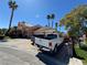 Beautiful home with mature palms in a well-manicured lawn at 3341 Camino Gardens Way, Las Vegas, NV 89146