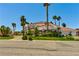 Spacious two-story home featuring a balcony, mature landscaping, and a three-car garage at 3341 Camino Gardens Way, Las Vegas, NV 89146