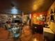 Game room with a bar area, pool table, and plenty of space for entertaining guests at 3341 Camino Gardens Way, Las Vegas, NV 89146