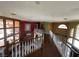 Hallway overlooking the grand living room with high ceilings and ample natural light at 3341 Camino Gardens Way, Las Vegas, NV 89146