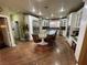 Open-concept kitchen with an island and hardwood floors flows nicely in the home at 3341 Camino Gardens Way, Las Vegas, NV 89146
