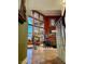 Elegant living room with fireplace, high ceilings, and a wall of windows at 3341 Camino Gardens Way, Las Vegas, NV 89146