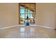 Living room with large window and a charming fireplace at 3341 Camino Gardens Way, Las Vegas, NV 89146