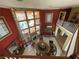 Spacious living room with high ceilings, fireplace, large windows overlooking the pool at 3341 Camino Gardens Way, Las Vegas, NV 89146