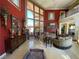 Spacious living room with high ceilings, a fireplace, and elegant decor for luxurious living and entertaining at 3341 Camino Gardens Way, Las Vegas, NV 89146