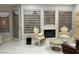 Bright sitting area shows the fireplace in the main bedroom with lots of natural light at 3341 Camino Gardens Way, Las Vegas, NV 89146