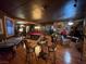 Recreation room featuring a pool table, game table, and comfortable seating at 3341 Camino Gardens Way, Las Vegas, NV 89146