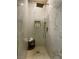 Modern shower featuring sleek fixtures, marble tile walls, and a convenient built-in niche at 3341 Camino Gardens Way, Las Vegas, NV 89146