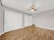 This is a bright bedroom with a ceiling fan and lots of closet space at 3425 E Russell Rd # 114, Las Vegas, NV 89120